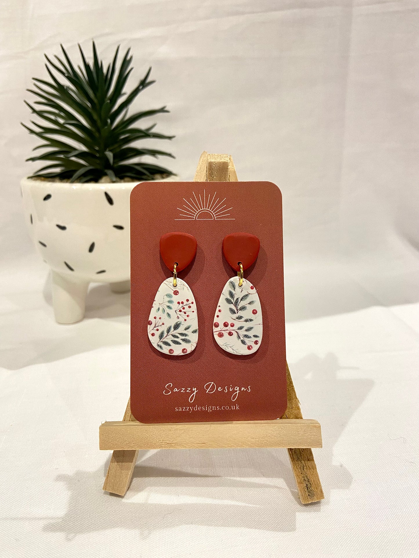 Festive pattern dangle earrings